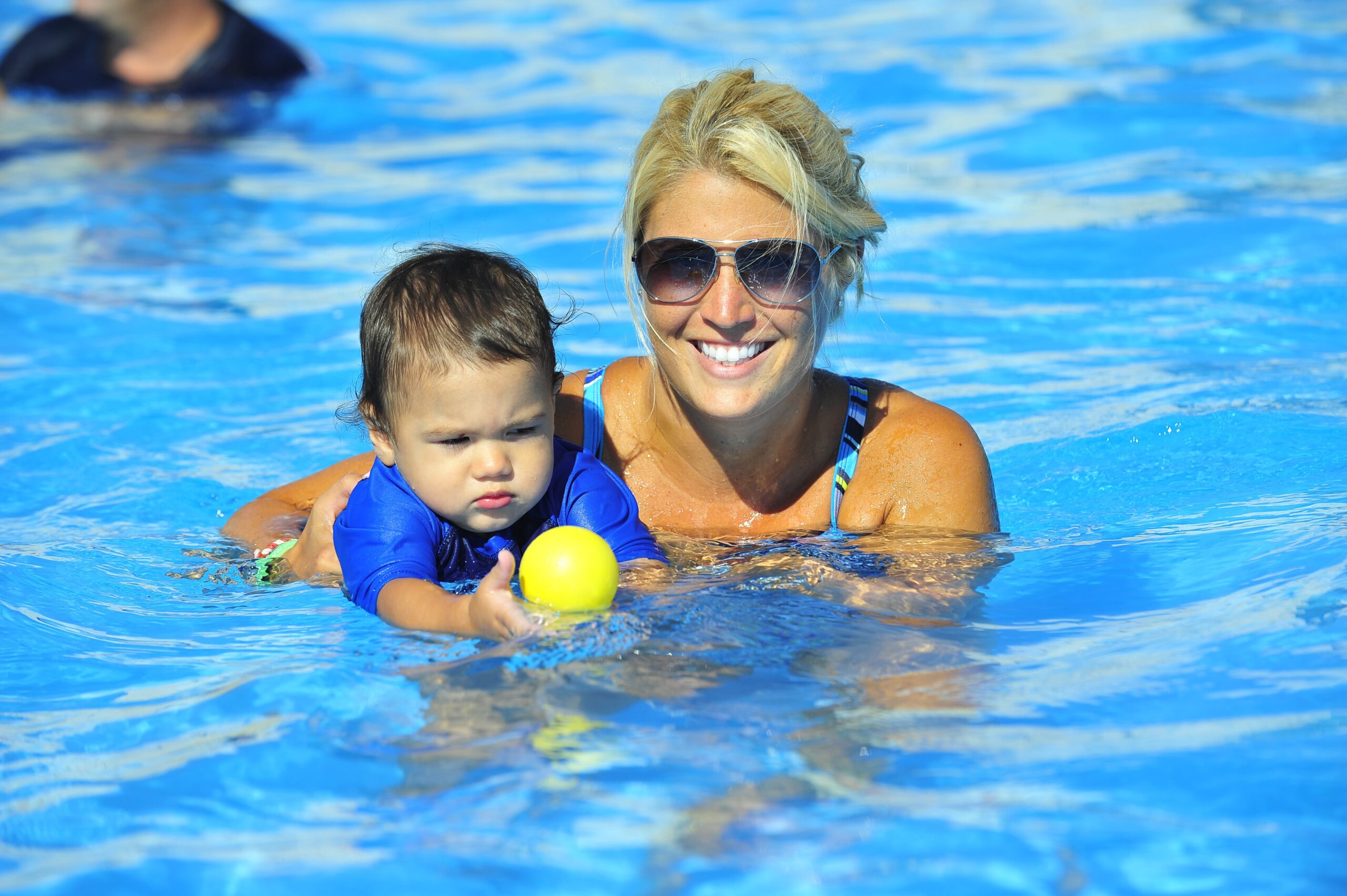 Woman and Baby in a Pool