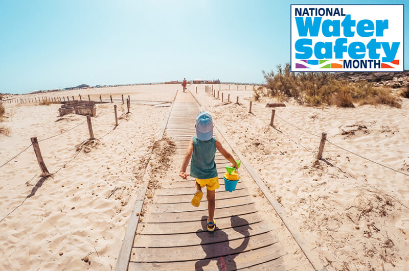ittle Boy Heading for the Beach During Water Safety Month