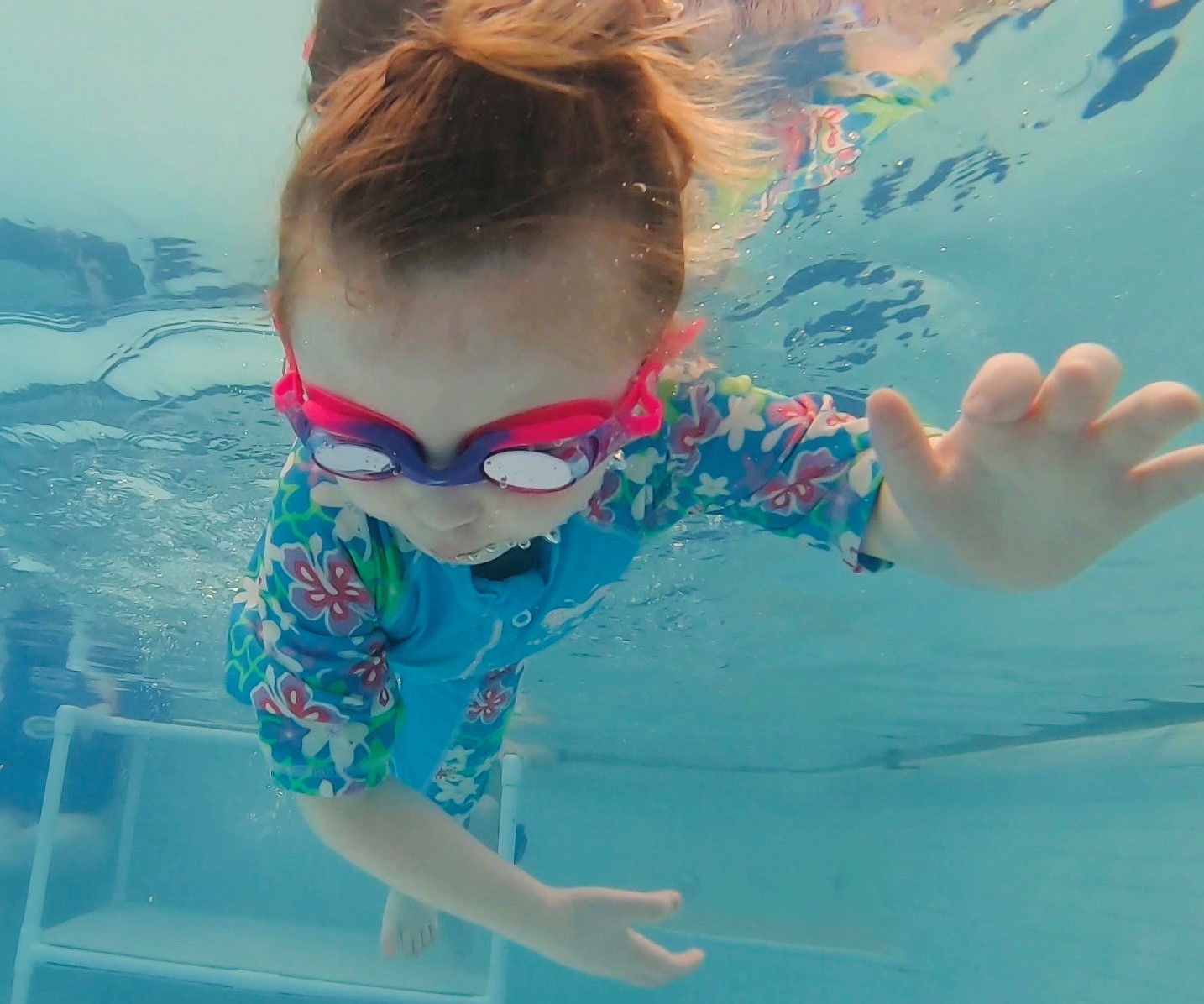 Toddler Learning Breath Exchange at Njswim School with Paddle, Paddle, Pop